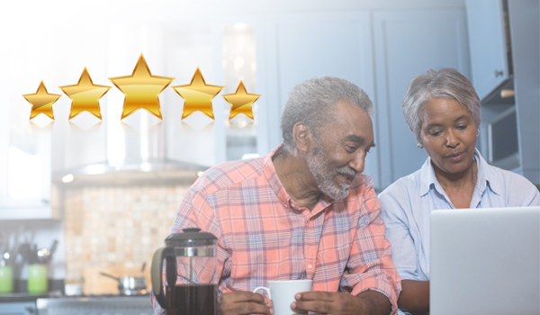 An elderly couple is reviewing health plans and Star ratings